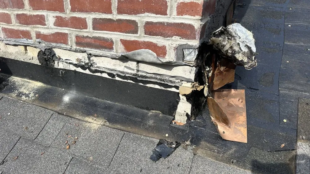 Slide of Otukan Roofing