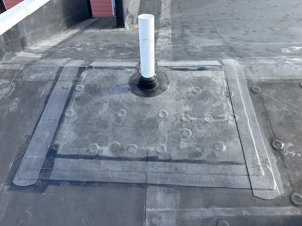 Slide of Otukan Roofing