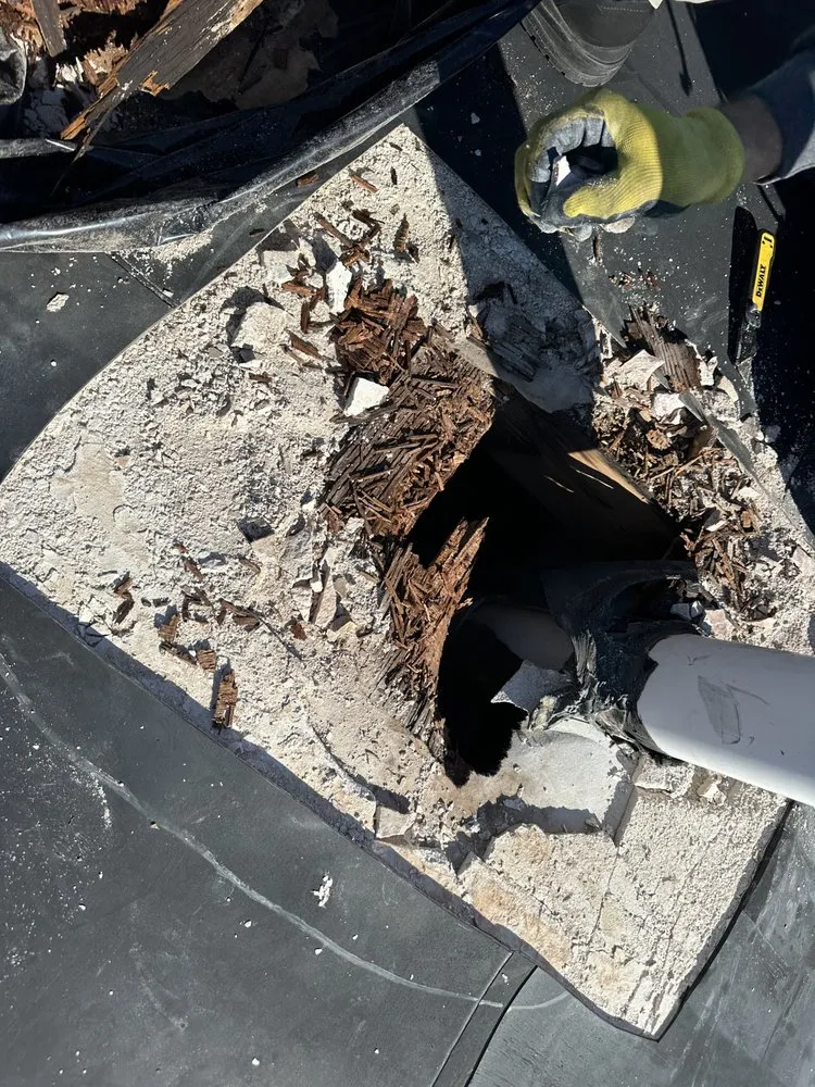 Slide of Otukan Roofing