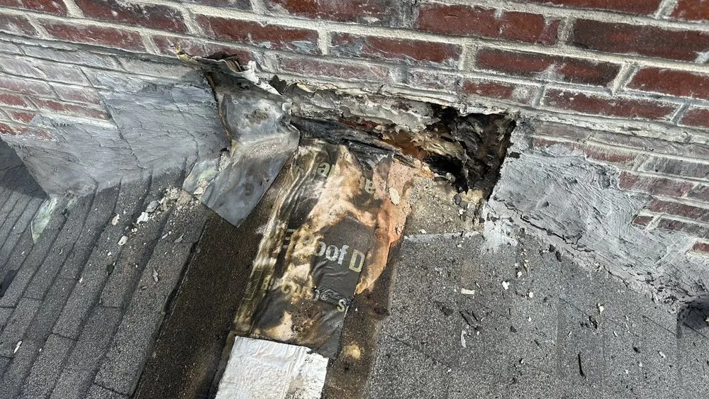 Slide of Otukan Roofing