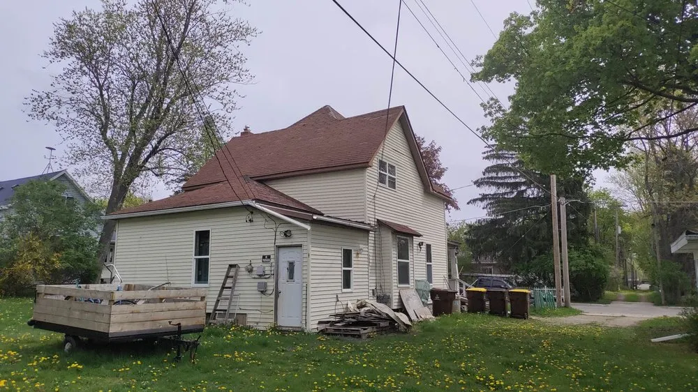 Local flat roof repair in Gowen, MI by Out & About Roofing
