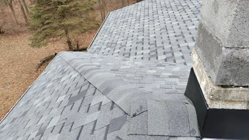 Emergency shingle roofing service with free inspection in Gowen, MI by Out & About Roofing