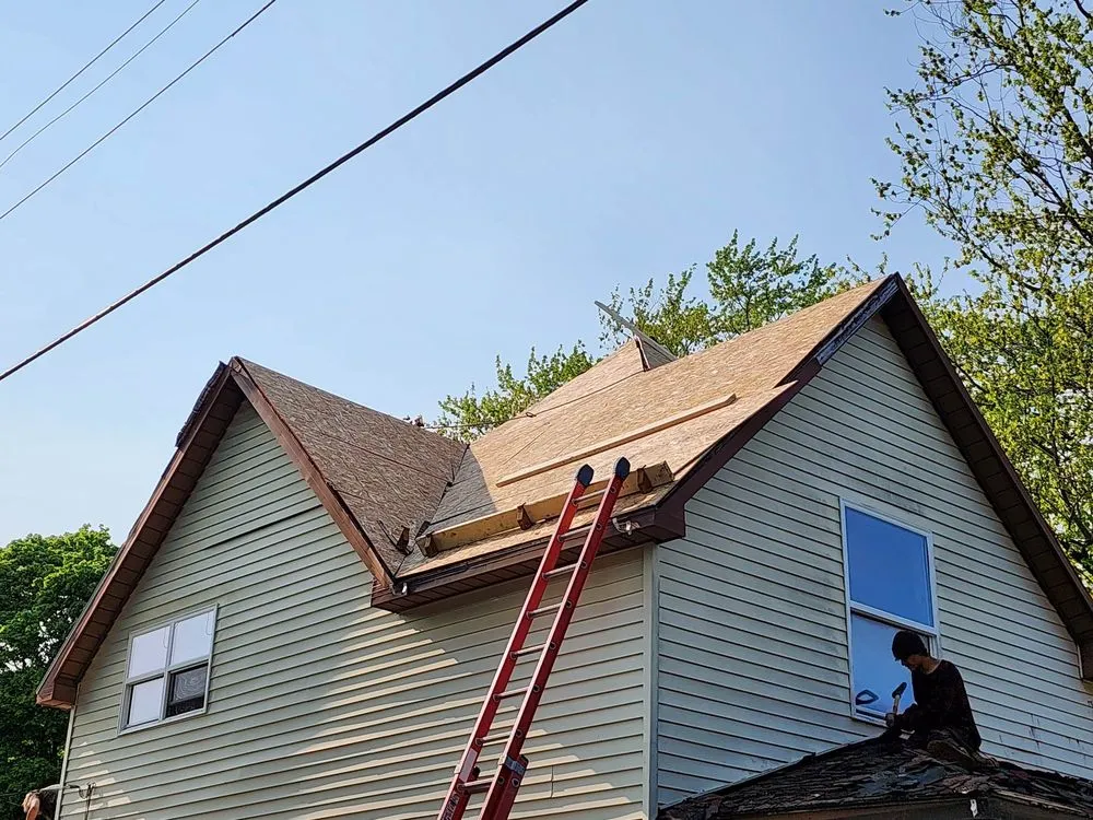 Trusted storm damage roof repair in Gowen, MI by Out & About Roofing