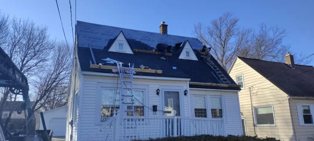 Top-rated storm damage roof repair in Gowen, MI by Out & About Roofing