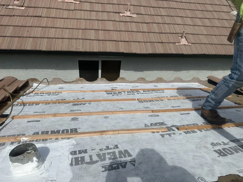 Slide of Out Of This World Roofing