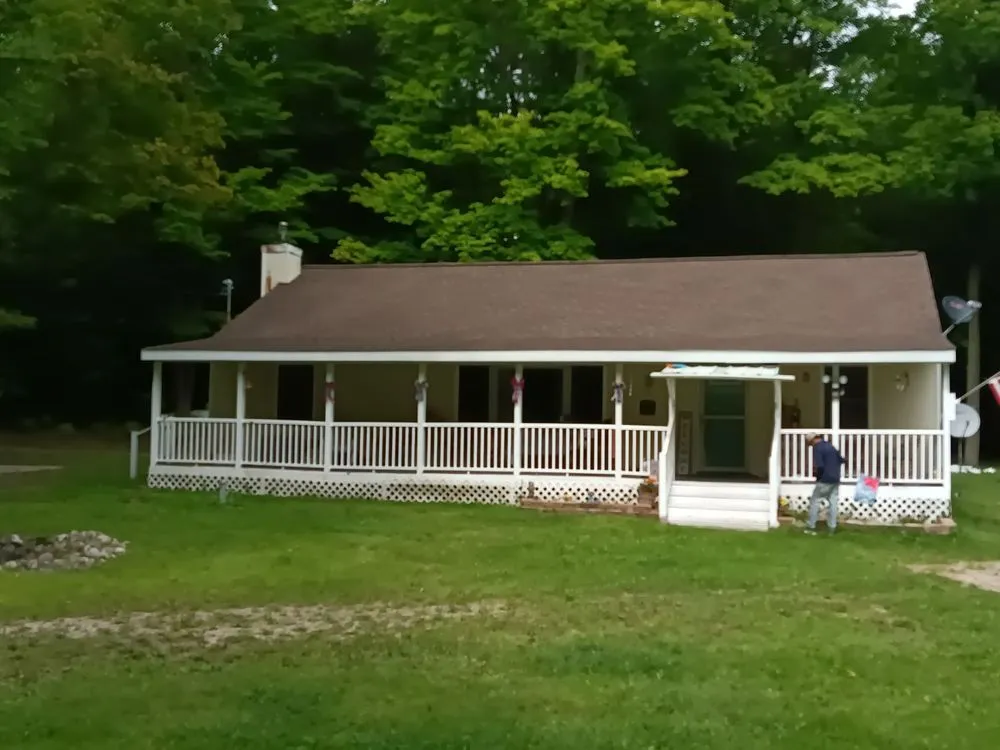 Trusted roof repair for fast service in Williamsburg, MI by Outdoor Living & Exteriors