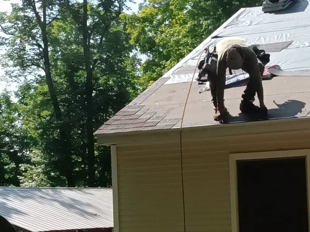 Emergency roof leak repair experts serving Williamsburg, MI - Outdoor Living & Exteriors