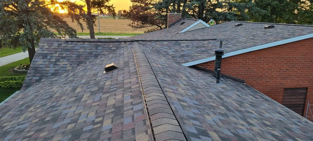 Slide of Outkast Roofing