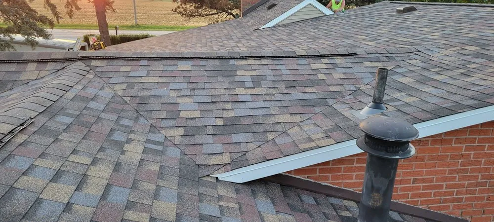 Slide of Outkast Roofing