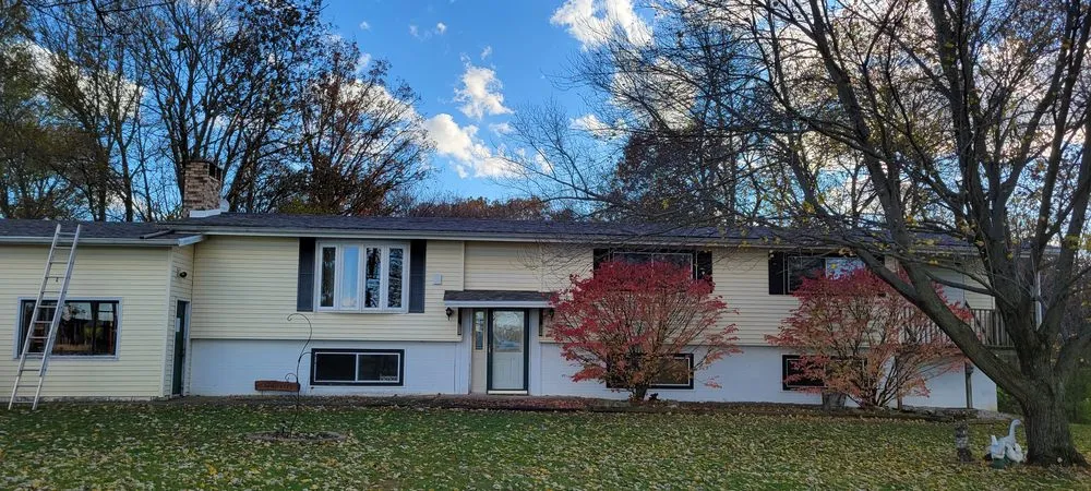 Slide of Outkast Roofing