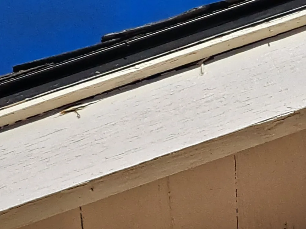 Slide of Outlaw Roofing