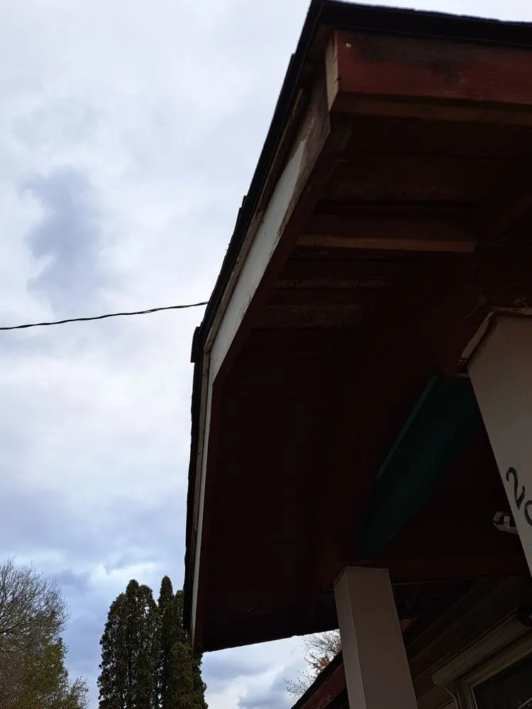 Slide of Outlaw Roofing