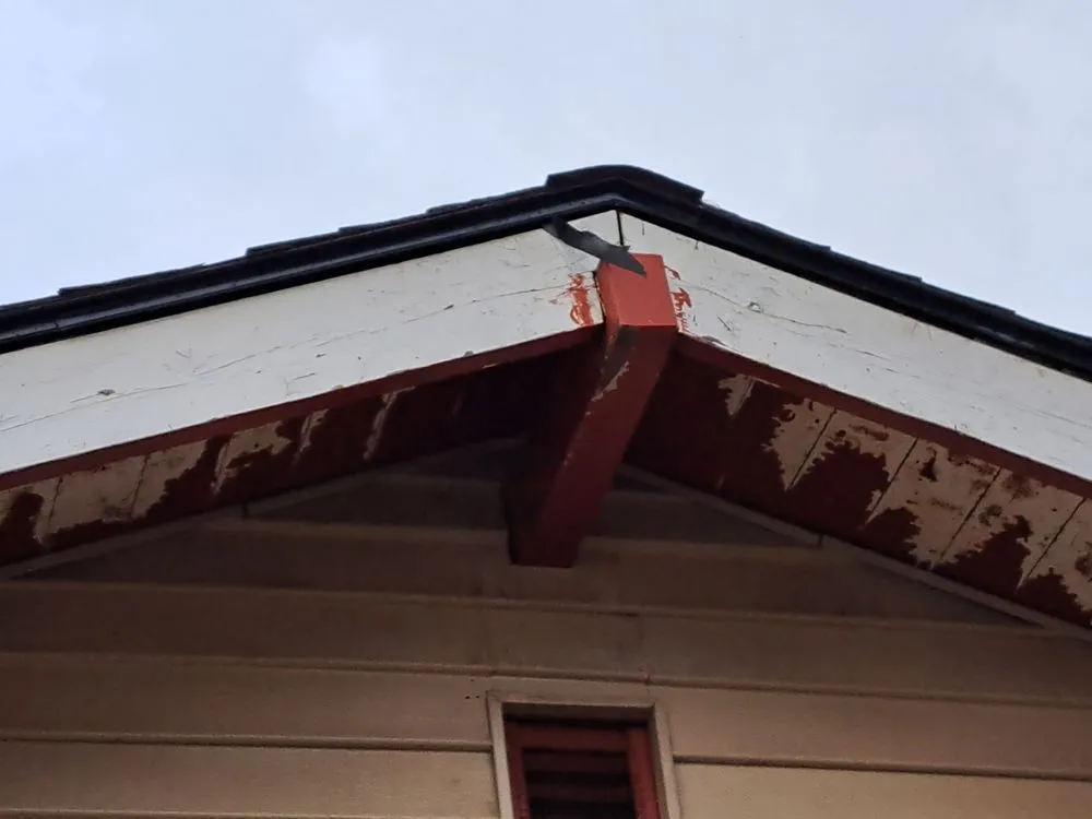 Slide of Outlaw Roofing