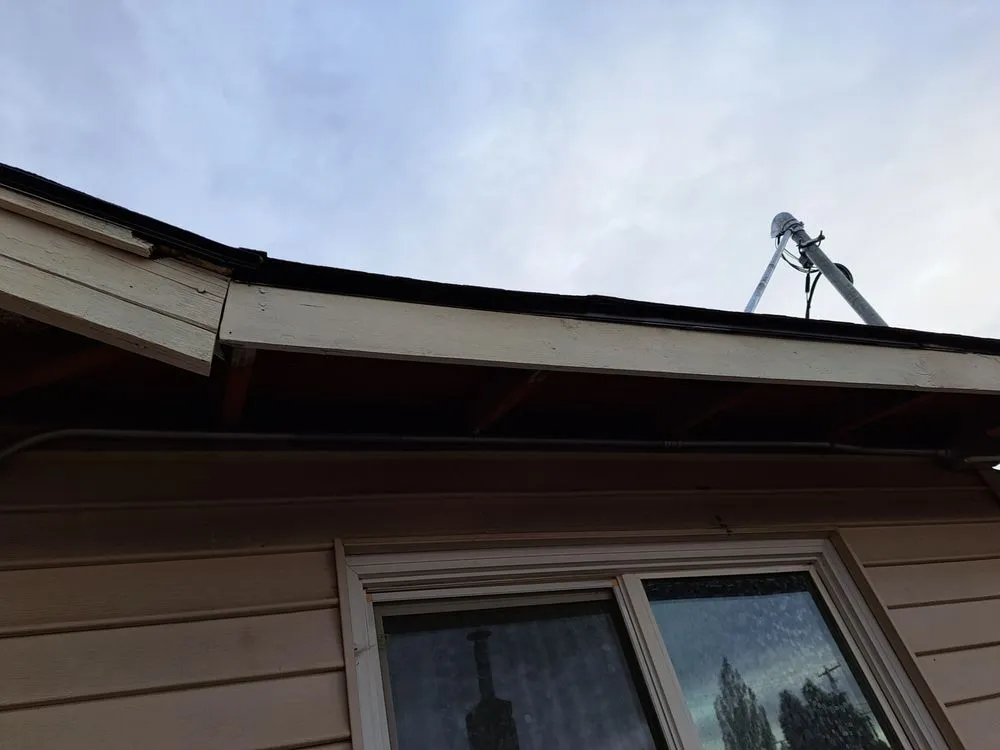 Slide of Outlaw Roofing