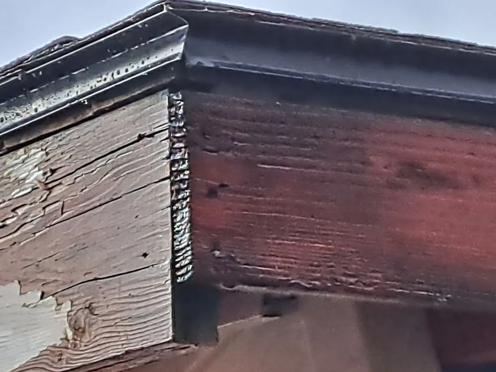 Slide of Outlaw Roofing