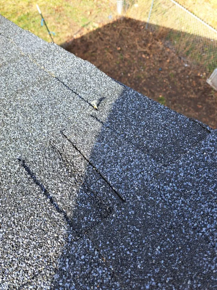 Slide of Outlaw Roofing