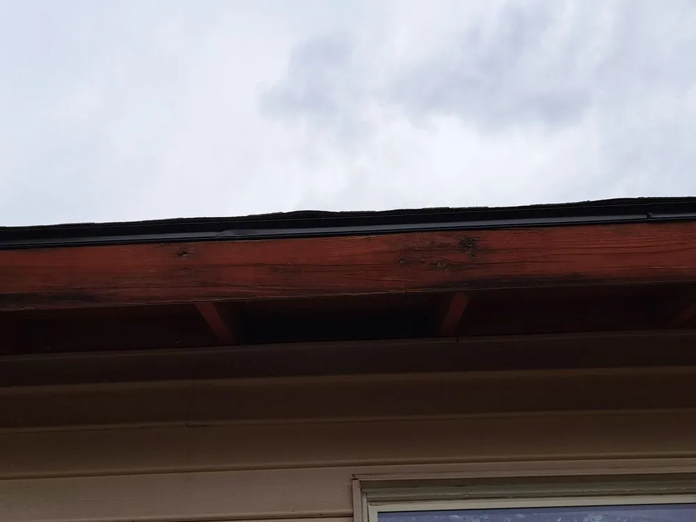 Slide of Outlaw Roofing