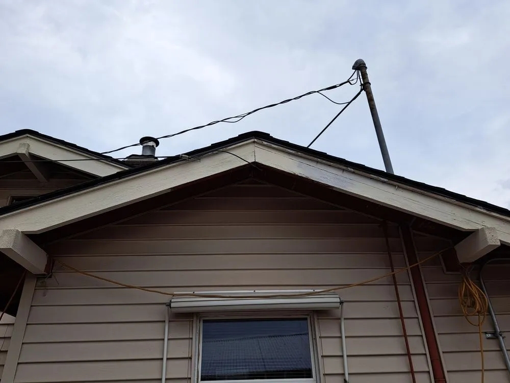 Slide of Outlaw Roofing