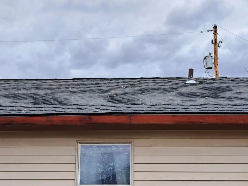 Slide of Outlaw Roofing