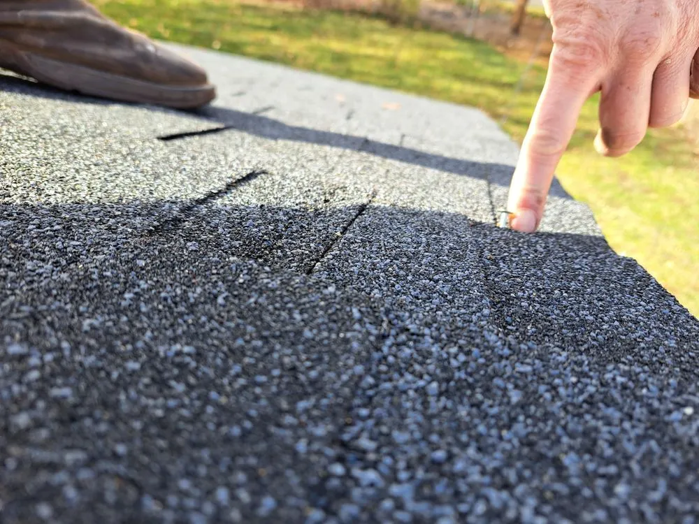 Slide of Outlaw Roofing