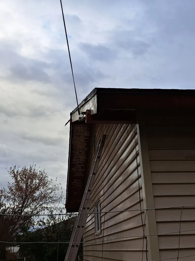 Slide of Outlaw Roofing