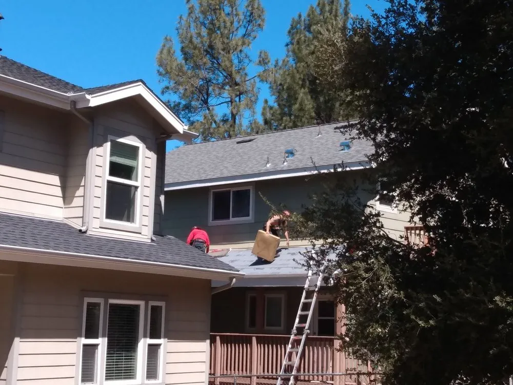 Slide of Outlaw Roofing