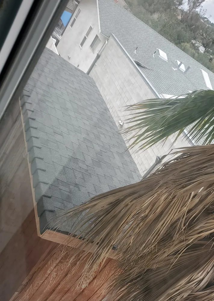 Slide of Outlaw Roofing