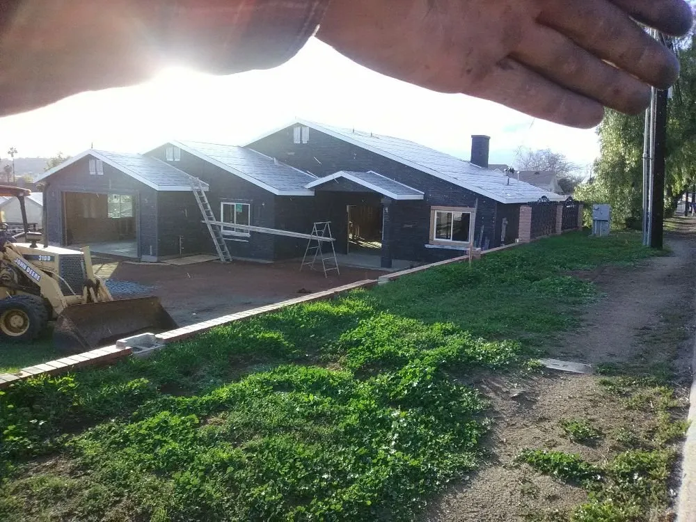 Slide of Outlaw Roofing