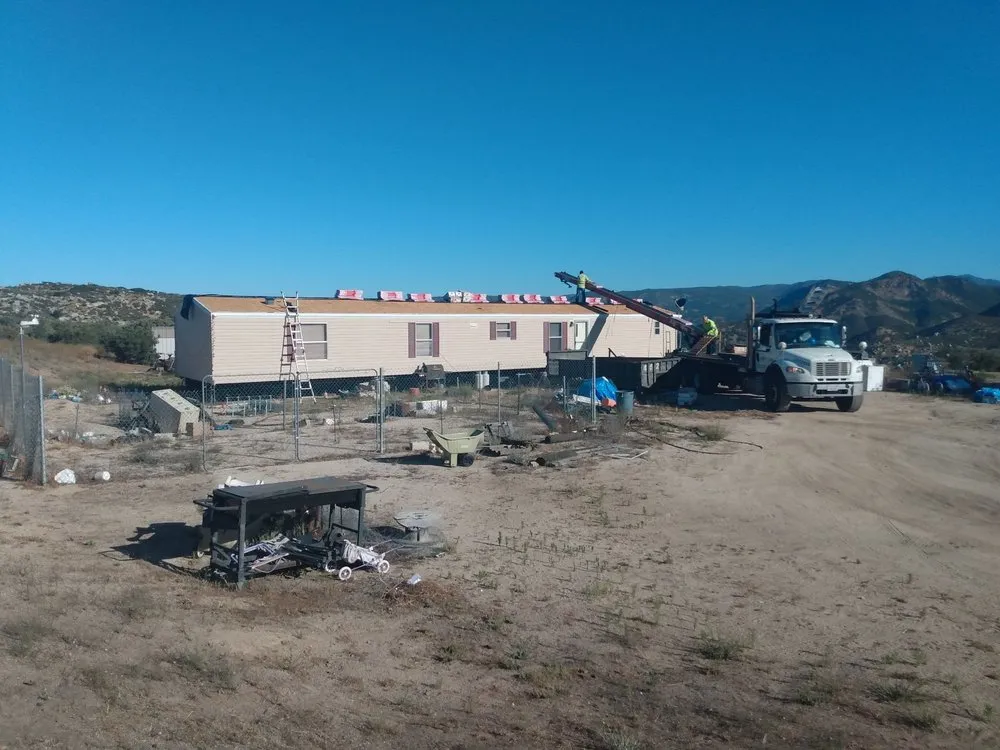 Slide of Outlaw Roofing