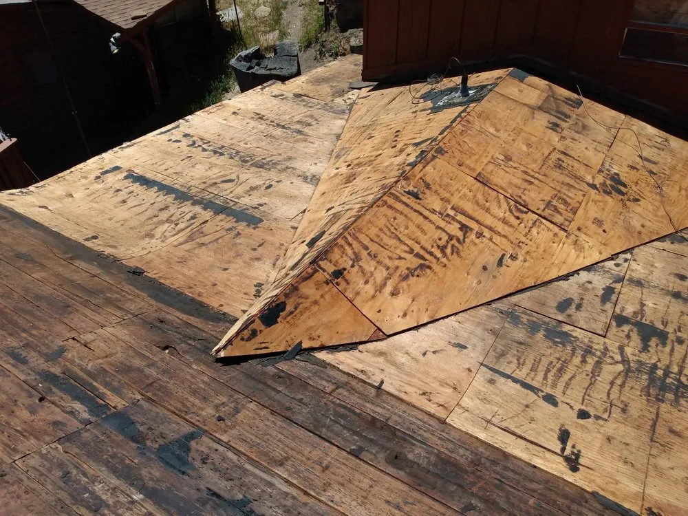 Slide of Outlaw Roofing