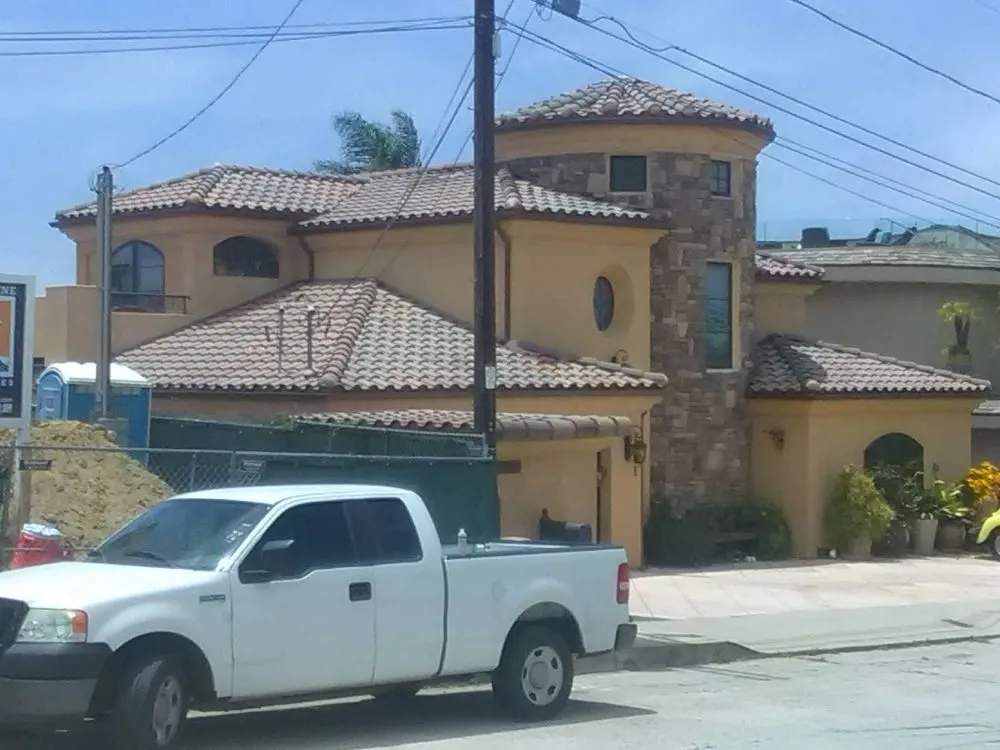 Slide of Outlaw Roofing