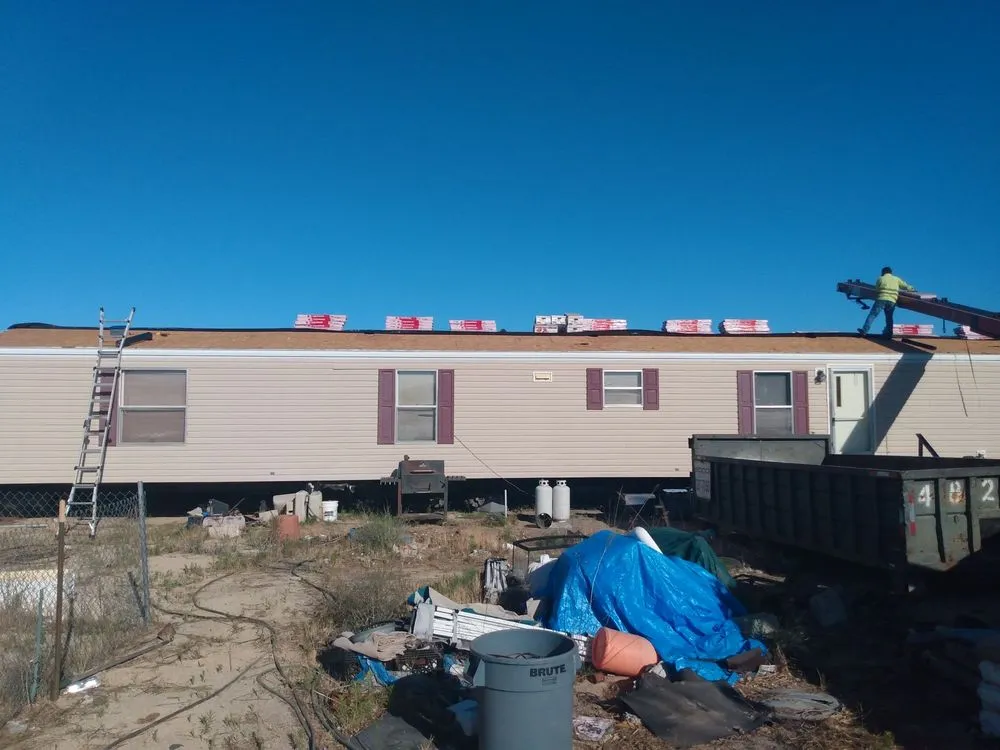 Slide of Outlaw Roofing