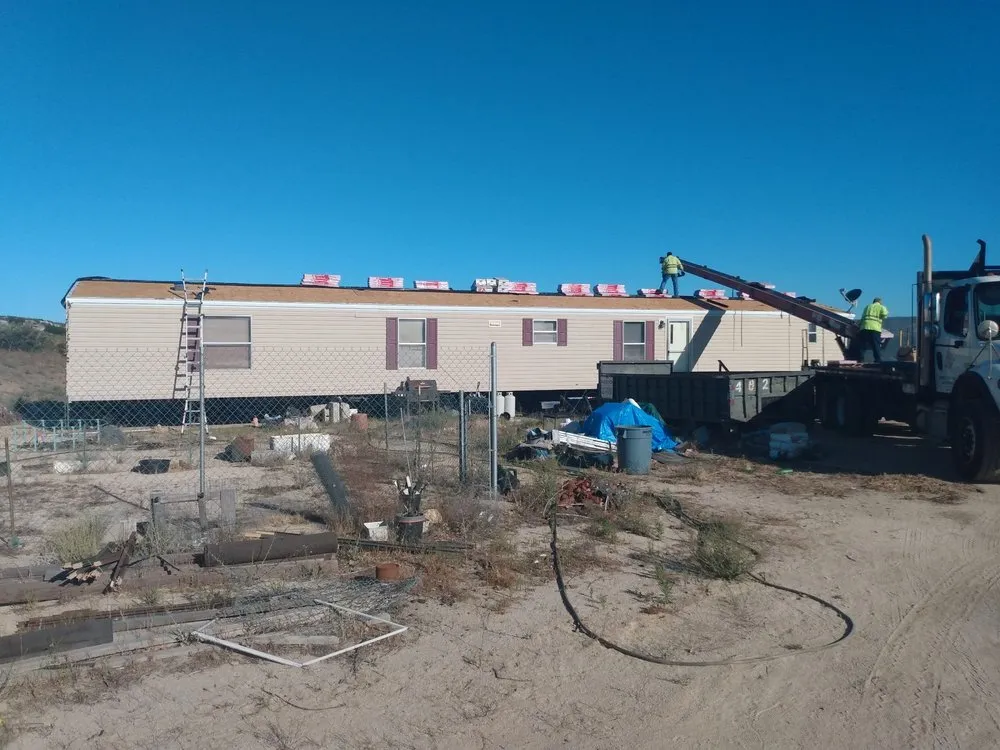 Slide of Outlaw Roofing