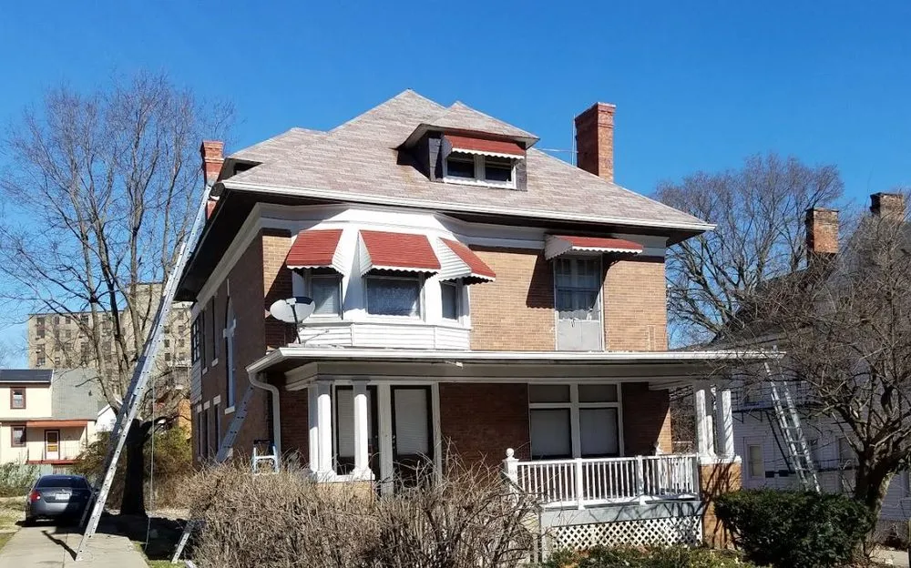 Slide of Outright Roofing