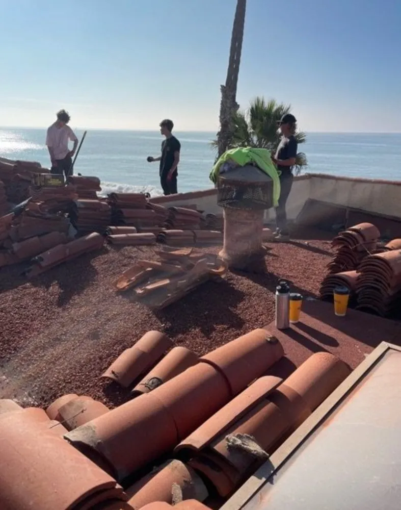 Slide of Over & Above Roofing