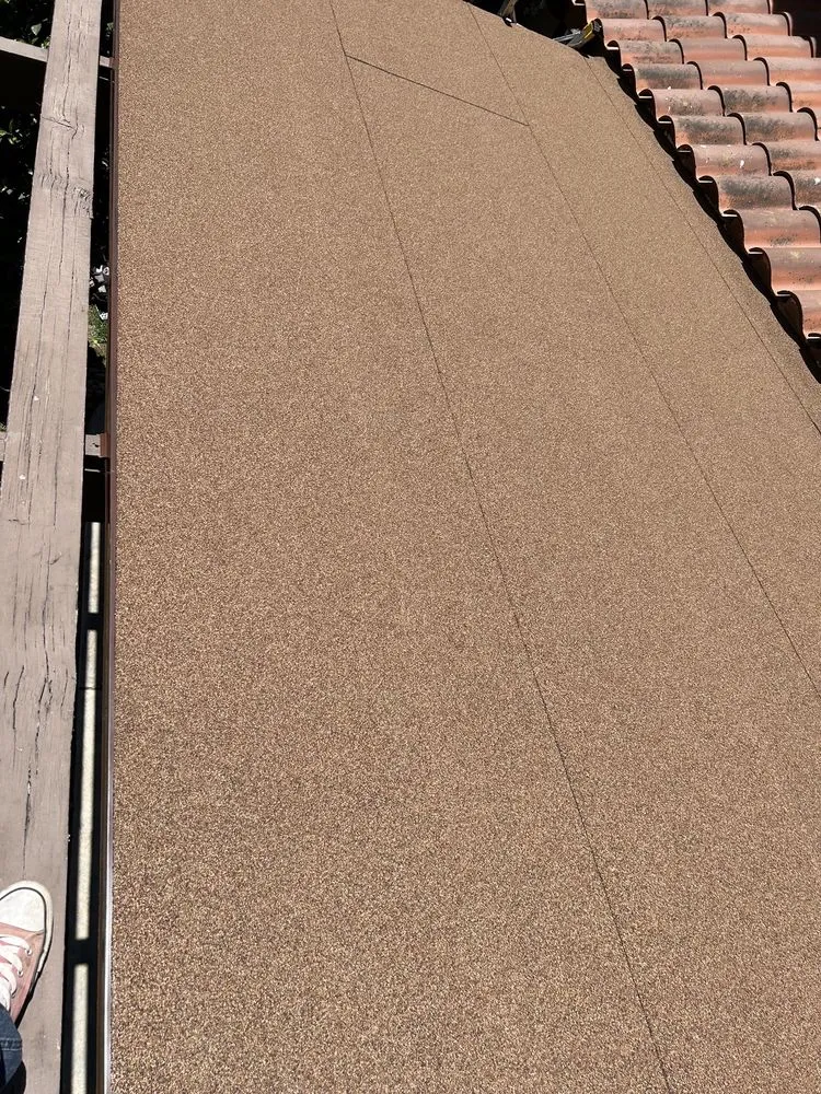 Slide of Over & Above Roofing