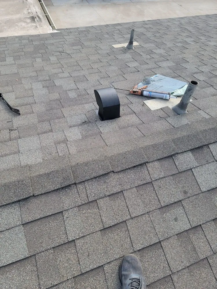 Slide of Over & Above Roofing