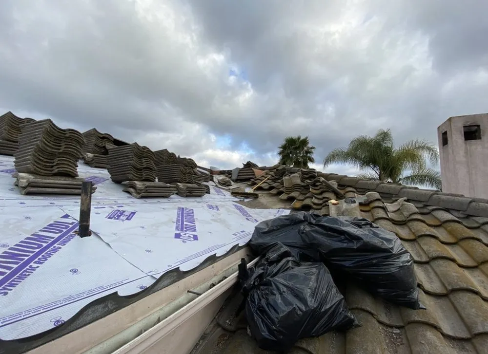 Slide of Over & Above Roofing