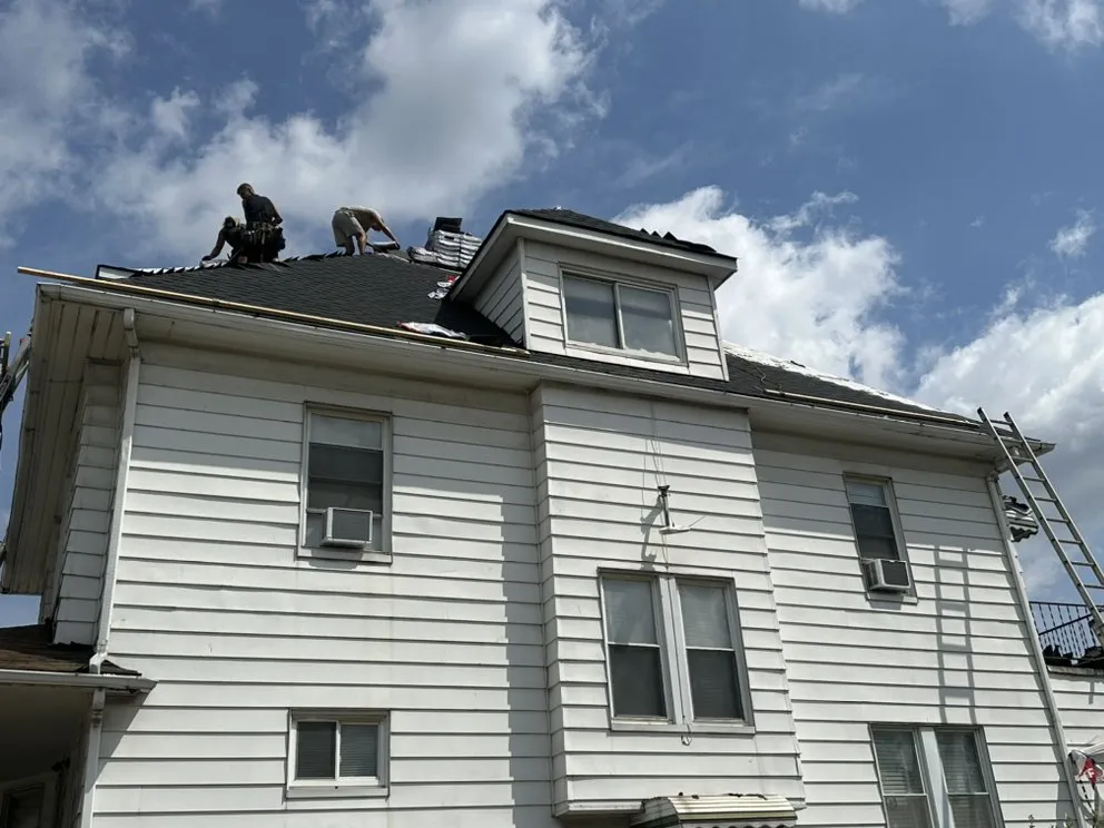 Slide of Over The Top Roofing & Exteriors