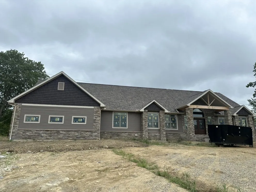 Slide of Over The Top Roofing & Exteriors