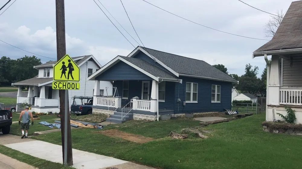 Slide of Over The Top Roofing & Remodeling