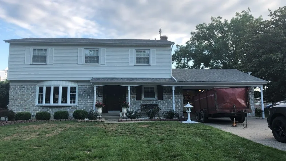 Slide of Over The Top Roofing & Remodeling