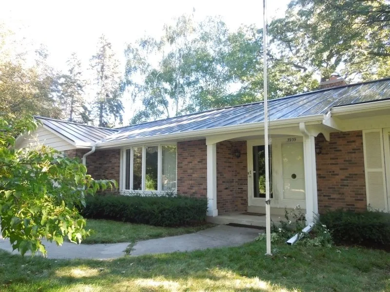 Slide of Over The Top Roofing and Construction
