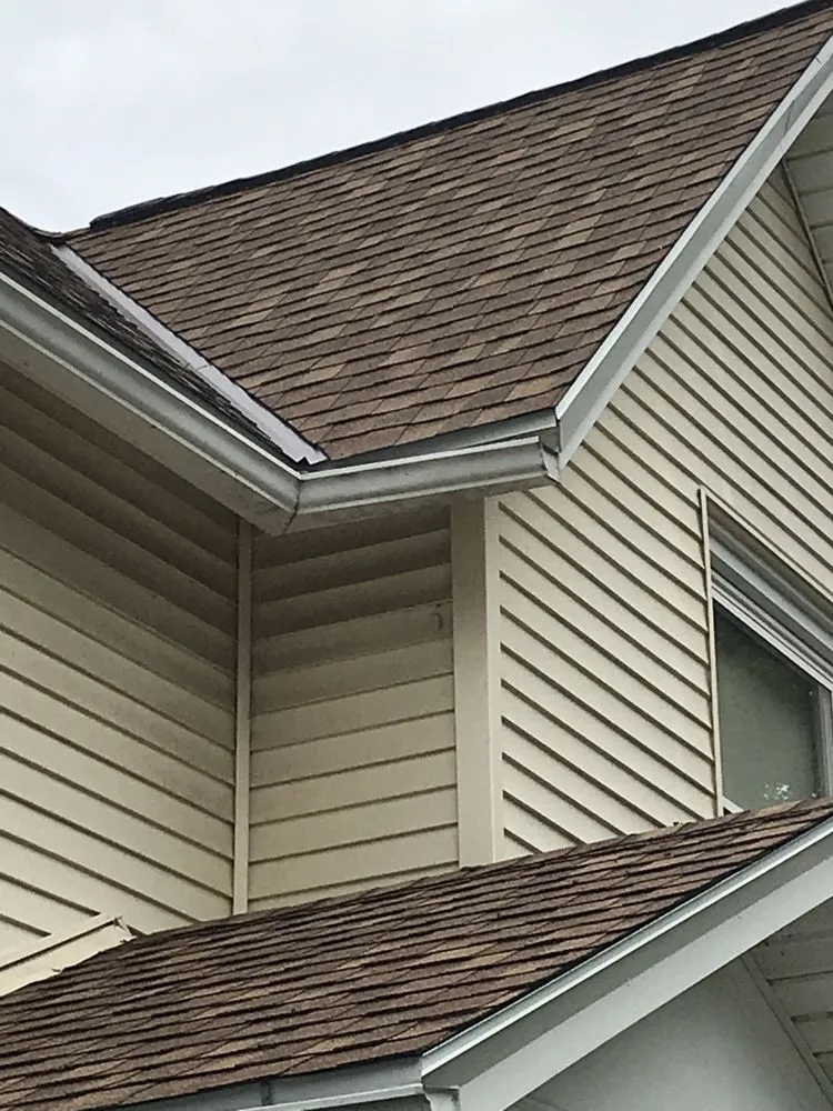 Slide of Over The Top Roofing and Construction