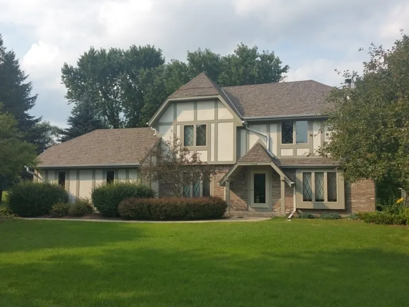Slide of Over The Top Roofing and Construction