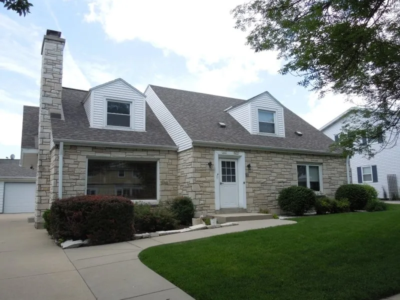 Slide of Over The Top Roofing and Construction