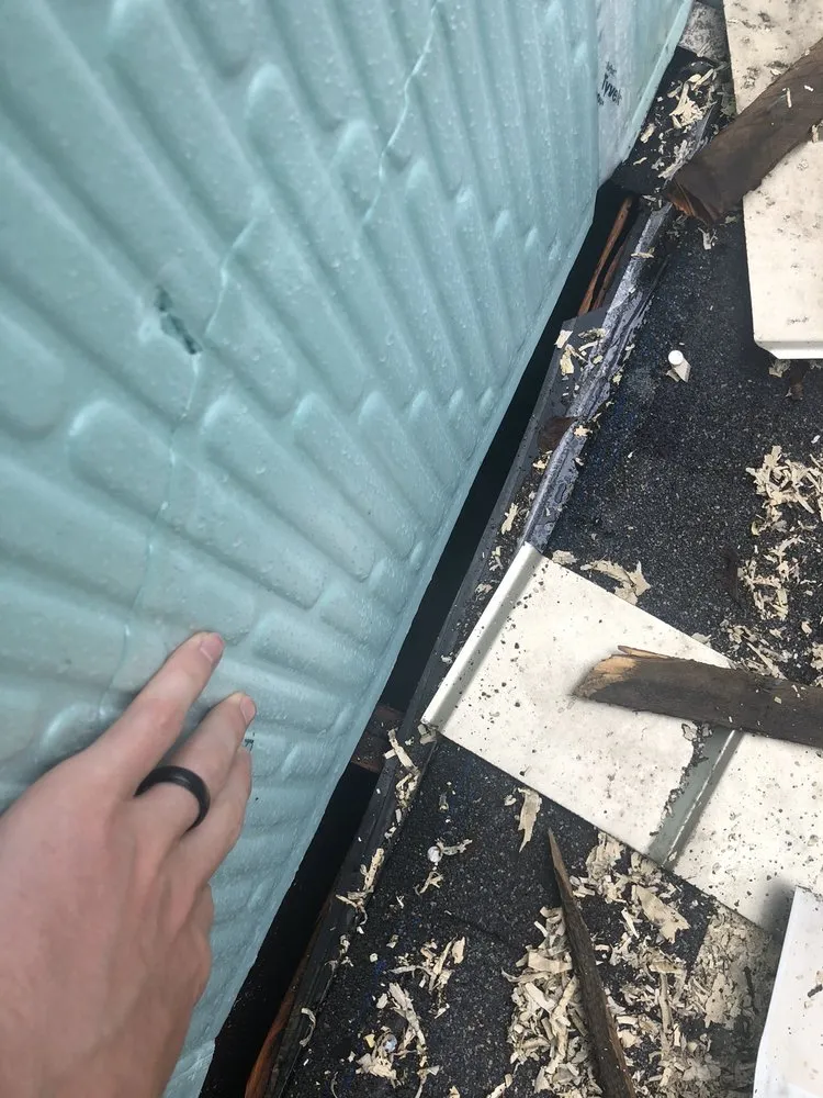 Slide of Over The Top Roofing and Construction