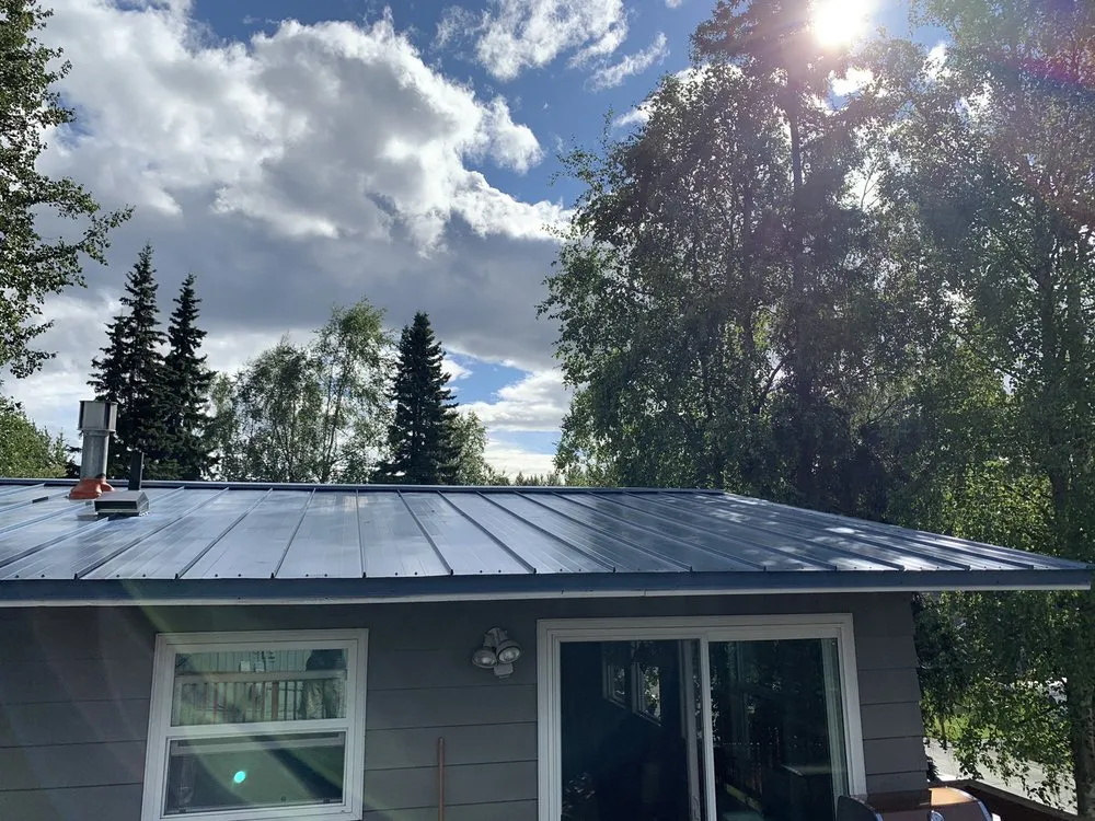 Slide of Over the Top Roofing LLC