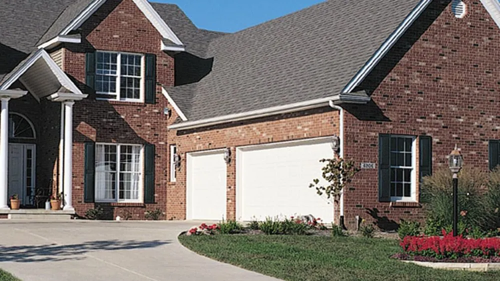 Slide of Over The Top Roofing Of Denver
