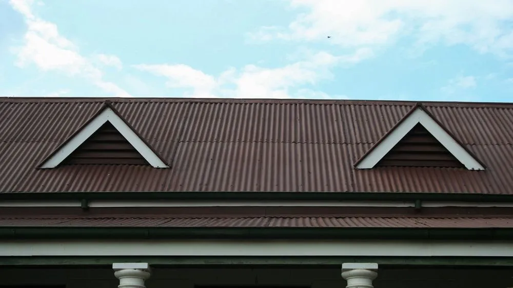 Slide of Over The Top Roofing Of Denver